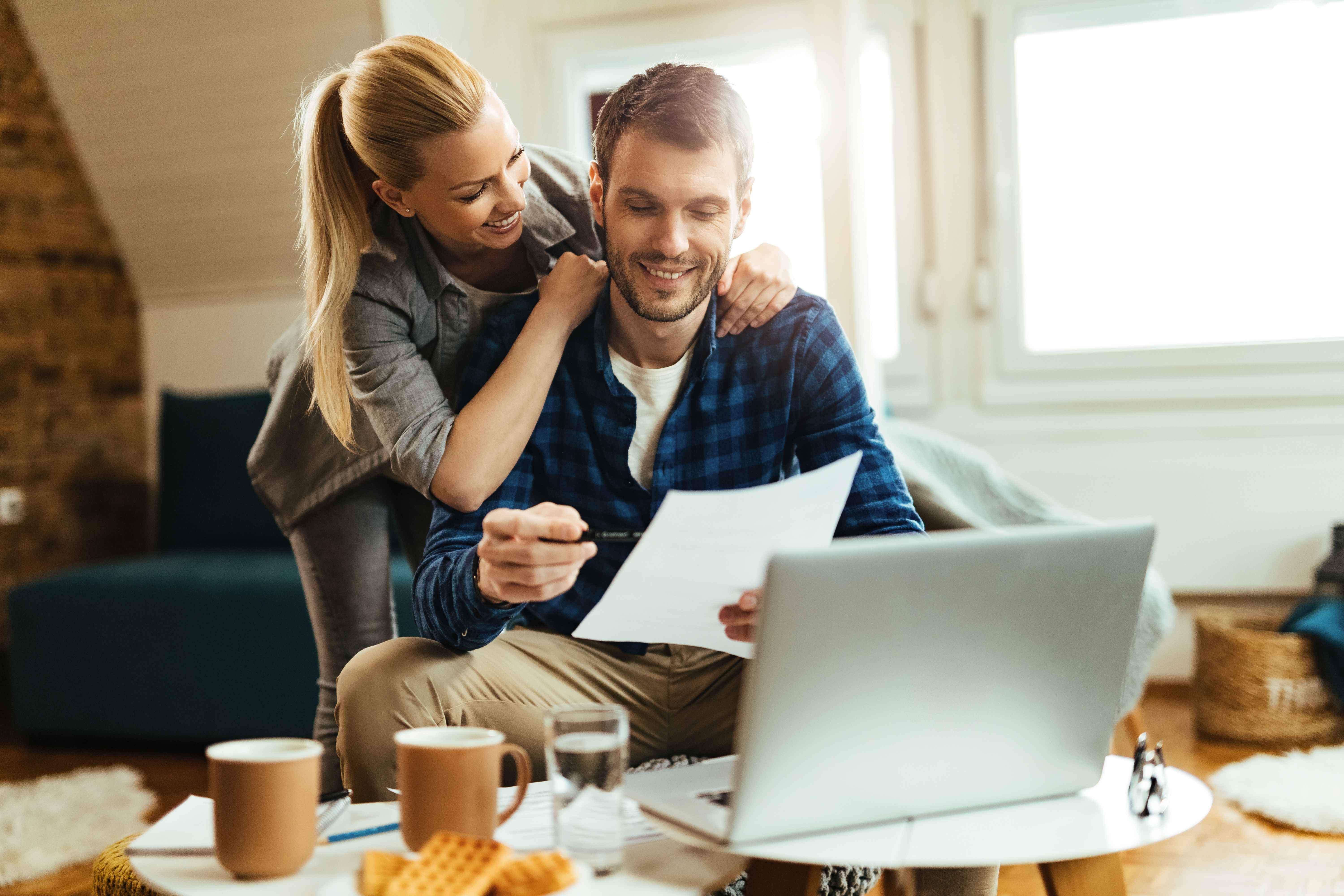 Couple reviewing loan documents